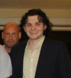 Just some guy who happened to be at the Miami house.  Not a team member.